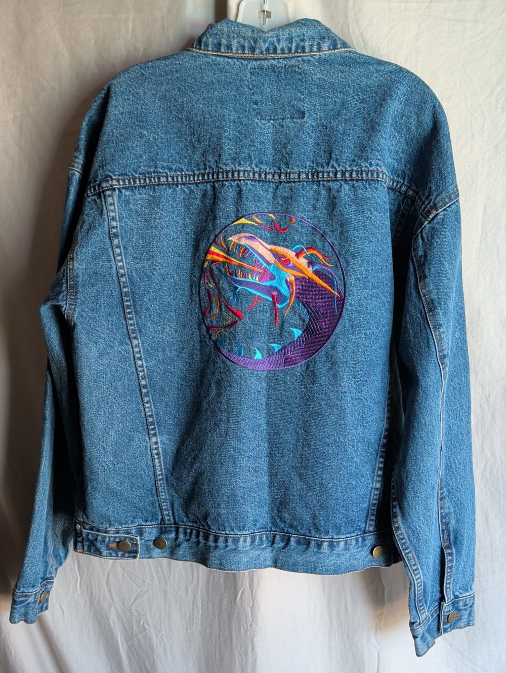 Embroidered Blue Denim Jacket with Multicolor Back Motif Casual Outer Wear